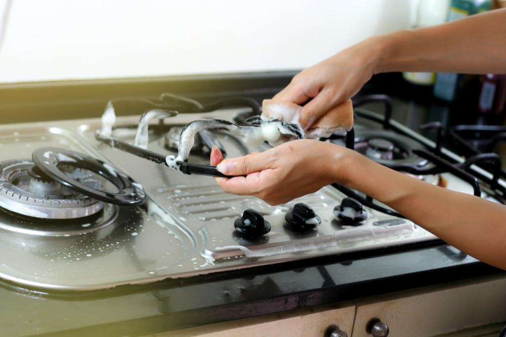 nettoyage de plaques de cuisson au gaz